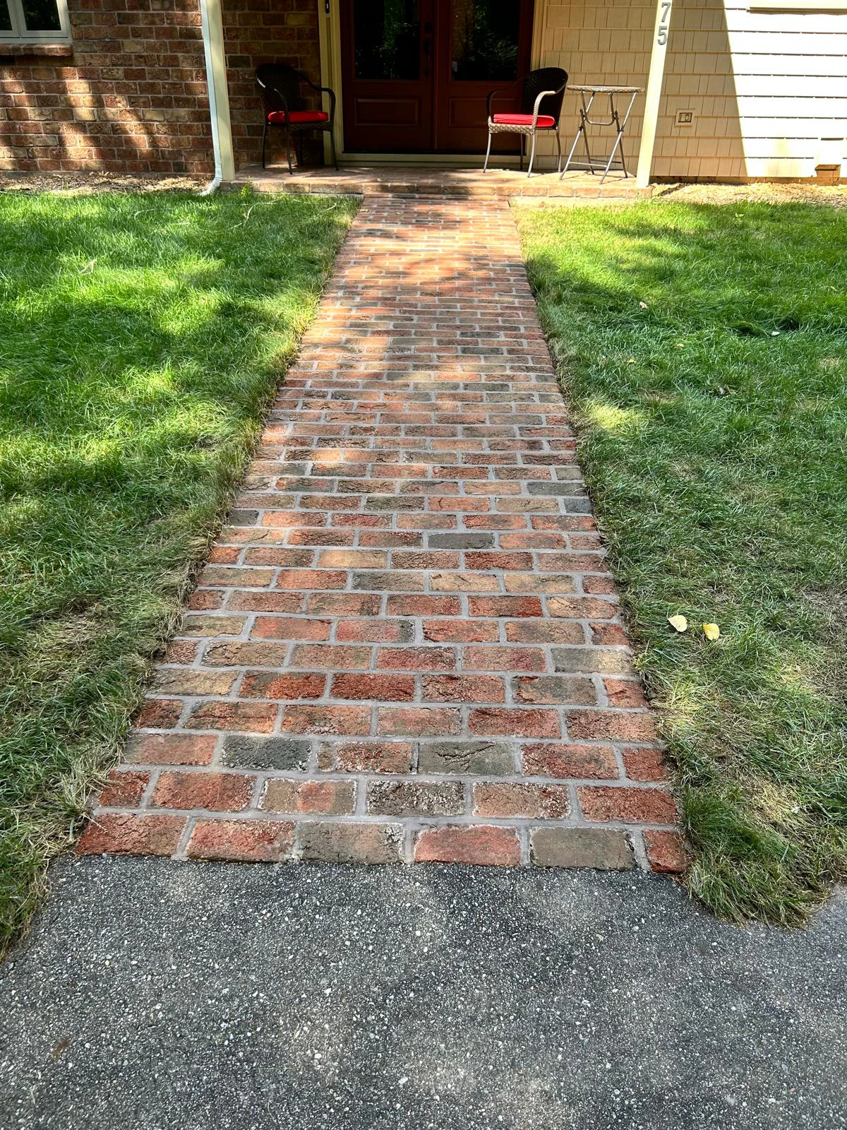 Restored brick walkway with fresh mortar joints